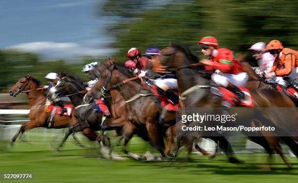 View of horses and riders competing in the British Stallion Studs Ebf Maiden Stakes race at Sandown Park racecourse in Surrey, England on 11th...