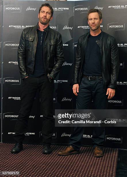 Aaron Eckhart and Gerad Butler during the photocall of the film Olympus Has Fallen