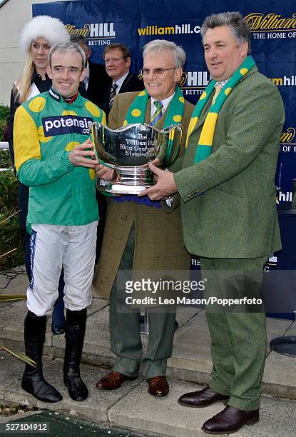 View of jockey Ruby Walsh, owner Clive Smith and trainer Paul Nicholls pictured together at the presentation ceremony after Kauto Star and Ruby Walsh...