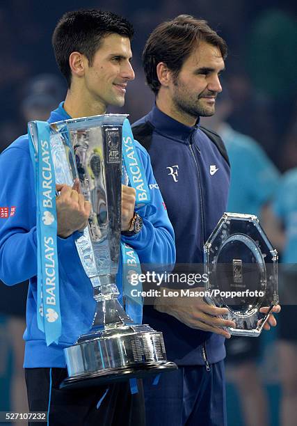 Barclays ATP World Tour Finals 02 Arena London UK FINAL Novak Djokovic SRB v Roger Federer Prize presentation Djokovic with the Cup after winning 6-4...