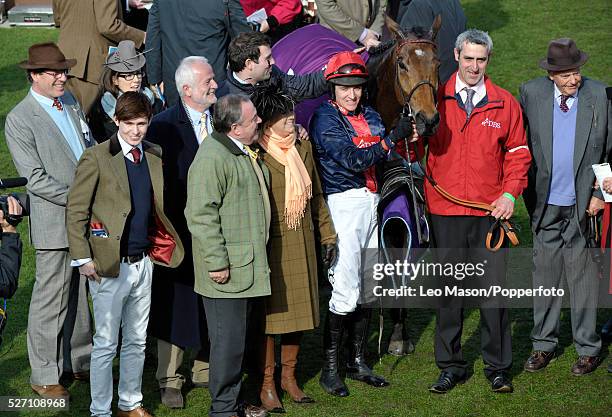 Barry Geraghty and Bobs Worth with the owners syndicate in the unsaddling enclosure after winning the RSA Chase during the 2012 Cheltenham National...