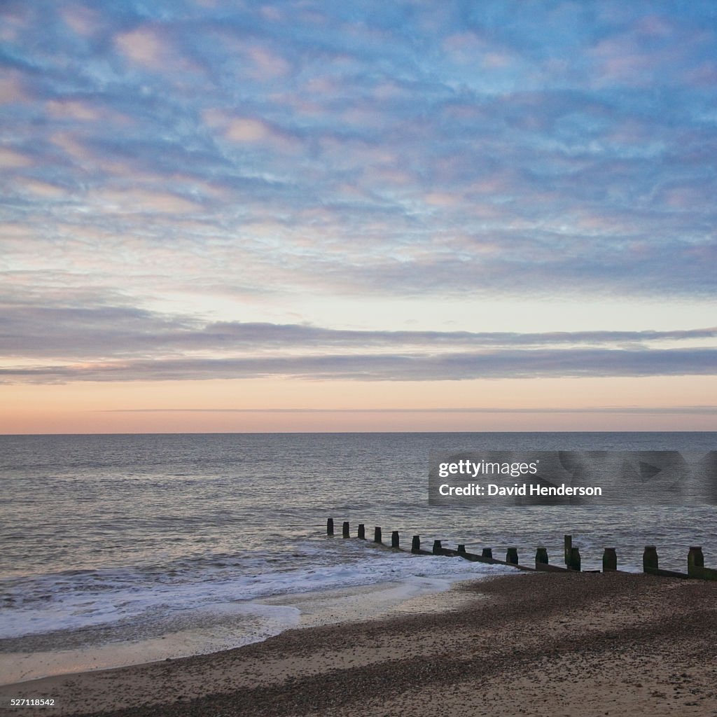 Groyne and dawn sky