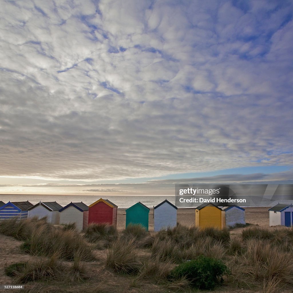 Line of beach huts in dunes