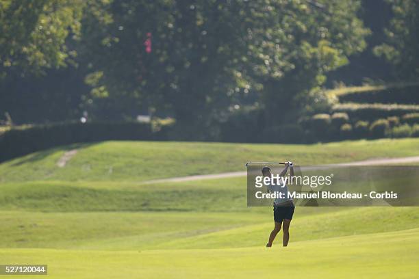 Azahara Munoz of Spain plays her approach shot on the 3rd hole during the First round of the Evian Masters Golf Tournament at the Evian Masters Golf...