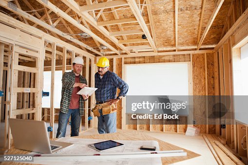 Multi-ethnic construction workers on a construction site Multi-ethnic construction workers on a construction site