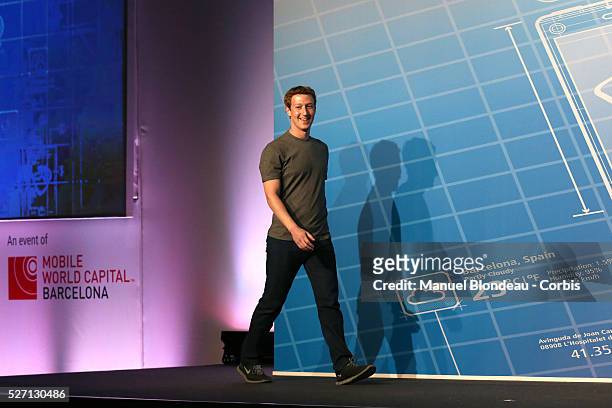 Mark Zuckerberg, chief executive officer of Facebook Inc., arrives for a keynote session on the opening day of the Mobile World Congress at the Fira...