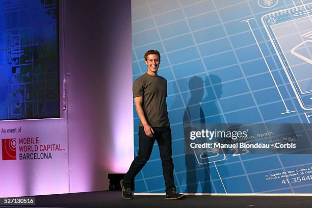 Mark Zuckerberg, chief executive officer of Facebook Inc., arrives for a keynote session on the opening day of the Mobile World Congress at the Fira...