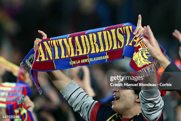 Fan of FC Barcelona celebrates during the UEFA Champions League round of 16 second leg football match between FC Barcelona and AC Milan at the Camp...