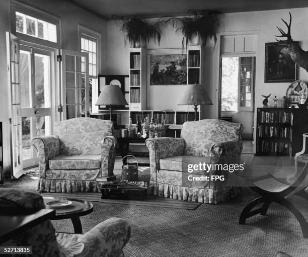 Interior view of the parlor inside the house where American writer Ernest Hemingway lived, just outside Havana, Cuba, 1950s. Hemingway lived in the...