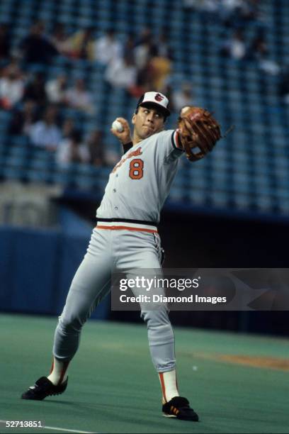 Shortstop Cal Ripken, Jr of the Baltimore Orioles warms up prior to a game against the Toronto Blue Jays in September 1987 at Exhibition Stadium in...