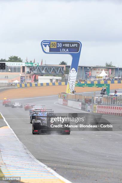 World Endurance Championship 2013 - Racing cars drive behind the safety car during the 90th 24-hour Le Mans endurance race at the Circuit de la...