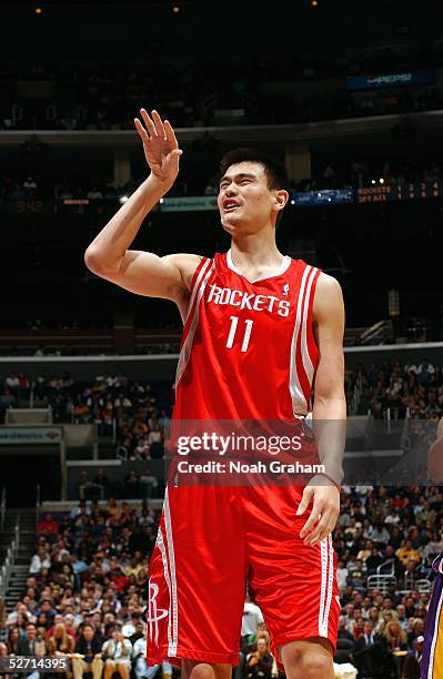 Yao Ming of the Houston Rockets gestures on the court during the game against the Los Angeles Lakers at Staples Center on April 7, 2005 in Los...