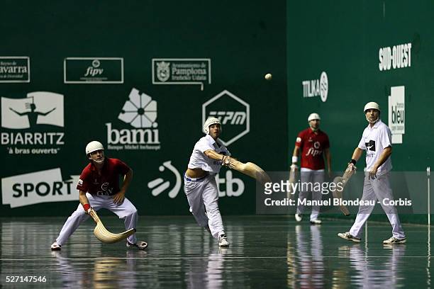 Diego Beaskoetxea and Eric Irastorza compete against Christophe Olha and Nicolas Etcheto during the Cesta Punta World Championship semi-finals match...
