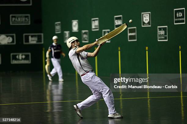 Aritz Erkiaga and Ortzi Txasio compete against Mikel Egiguren and Gotzon Enbil during the Cesta Punta World Championship semi-finals match at the Jai...