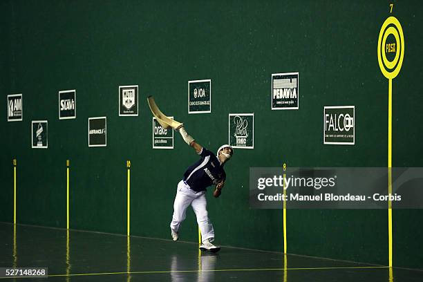 Aritz Erkiaga and Ortzi Txasio compete against Mikel Egiguren and Gotzon Enbil during the Cesta Punta World Championship semi-finals match at the Jai...