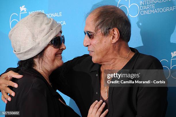 Singer Adriano Celentano and his wife Claudia Mori attend the photo call of "Yuppi Du" during 65th Venice Film Festival.