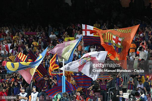 Supporters of FC Barcelona during the UEFA Champions league football match between FC Barcelona and Ajax Amsterdam at the Camp Nou stadium in...