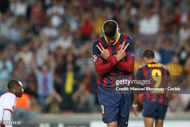 Gerard Pique of FC Barcelona celebrates after scoring his sides third goal during the UEFA Champions league football match between FC Barcelona and...