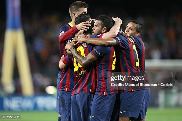 Lionel Messi of FC Barcelona celebrates with his teammates after scoring his sides opening goal during the UEFA Champions league football match...