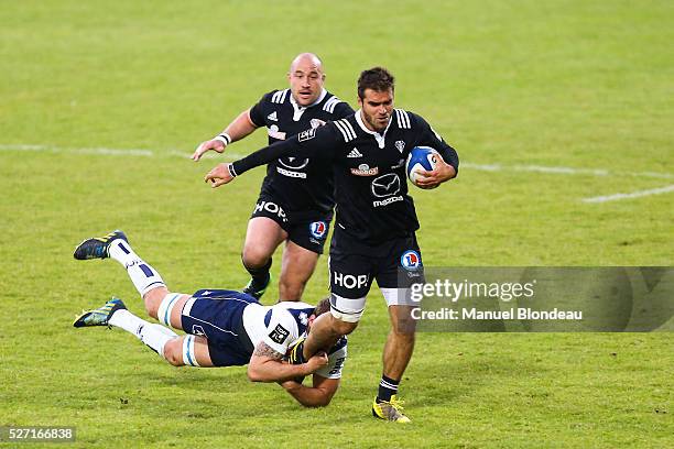 Gaetan Germain of Brive and Remi Vaquin of Agen during the French Top 14 rugby union match between SU Agen v CA Brive at Stade Armandie on April 30,...