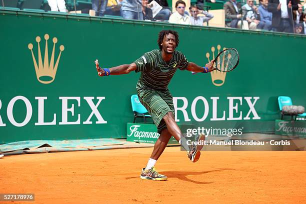 Gael Monfils of France celebrates defeating Roger Federer of Switzerland during day five of the Monte Carlo Rolex Masters tennis at the Monte-Carlo...