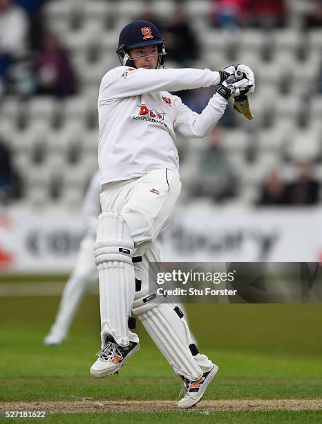 Esses batsman Tom Westley hooks to the boundary during his century on day two of the Specsavers County Championship Division Two match between...