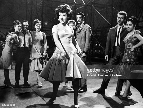 Rita Moreno singing in a scene from the movie West Side Story.