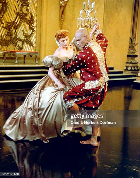 Deborah Kerr and Yul Brynner dance together in a classic scene from the film The King and I.