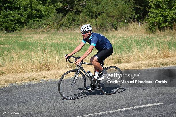 Cyclist Lance Armstrong is pictured as he rides a stage of The Tour De France for a leukaemia charity from Rodez to Mende, southwest France, on July...