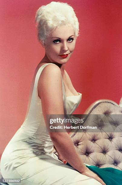 Kim Novak Wearing a Sleeveless Evening Gown