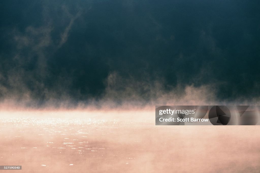 Mist rising from water