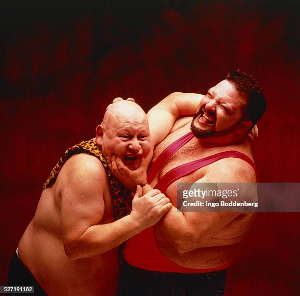 two wrestler in a fight - vintage wrestling stock-fotos und bilder