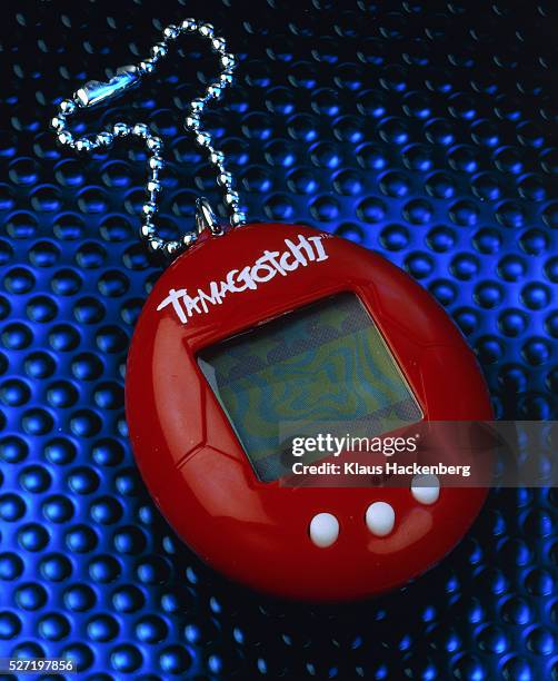 tamagotchi, gameboy - pocket electronic game stock pictures, royalty-free photos & images