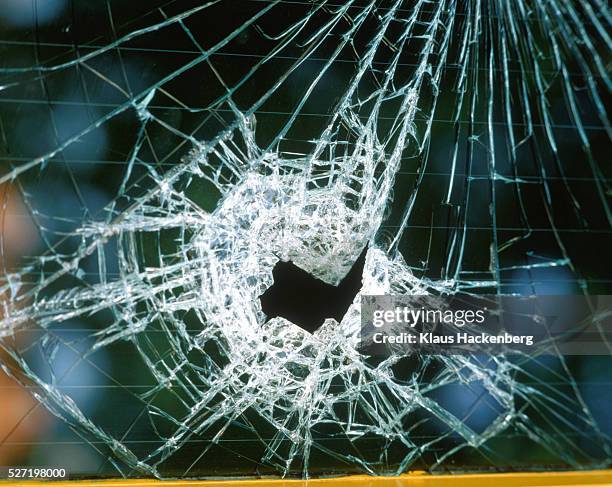 smashed window - riot stock pictures, royalty-free photos & images