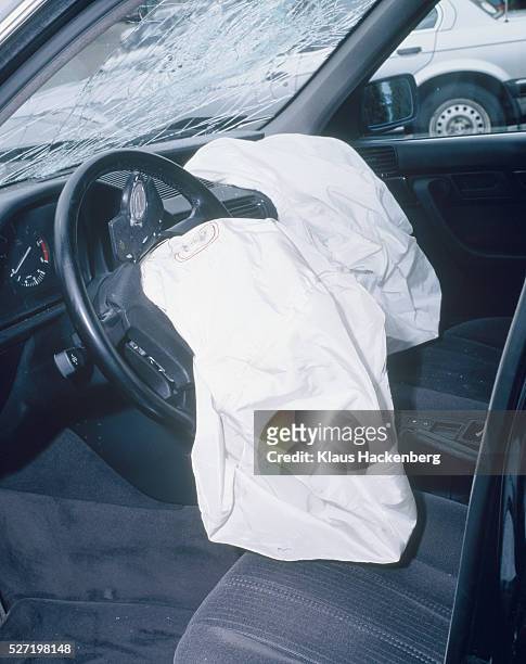 car crash and broken windshield - airbag stock-fotos und bilder