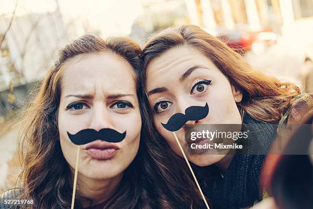 mustaches selfie - always with a smile stock pictures, royalty-free photos & images