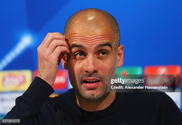 Josep Guardiola manager of Bayern Munich reacts during a FC Bayern Muenchen press conference ahead of their UEFA Champions League semi final second...