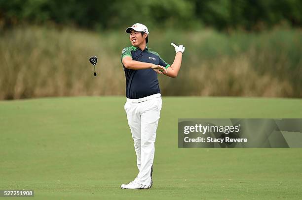 Byeong-Hun An of Korea hits his approach shot on the 18th hole during a continuation of the third round of the Zurich Classic at TPC Louisiana on May...