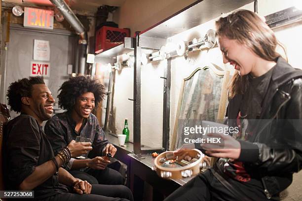 young people hanging out backstage at a theater - backstage stockfoto's en -beelden