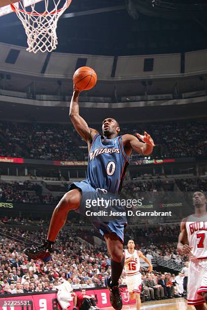 Gilbert Arenas of the Washington Wizards drives past Ben Gordon and Jannero Pargo of the Chicago Bulls during the first quarter of Game two of the...