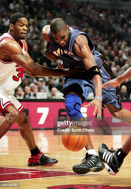 Antawn Jamison of the Washington Wizards drives against Antonio Davis of the Chicago Bulls in Game two of the Eastern Conference Quarterfinals during...