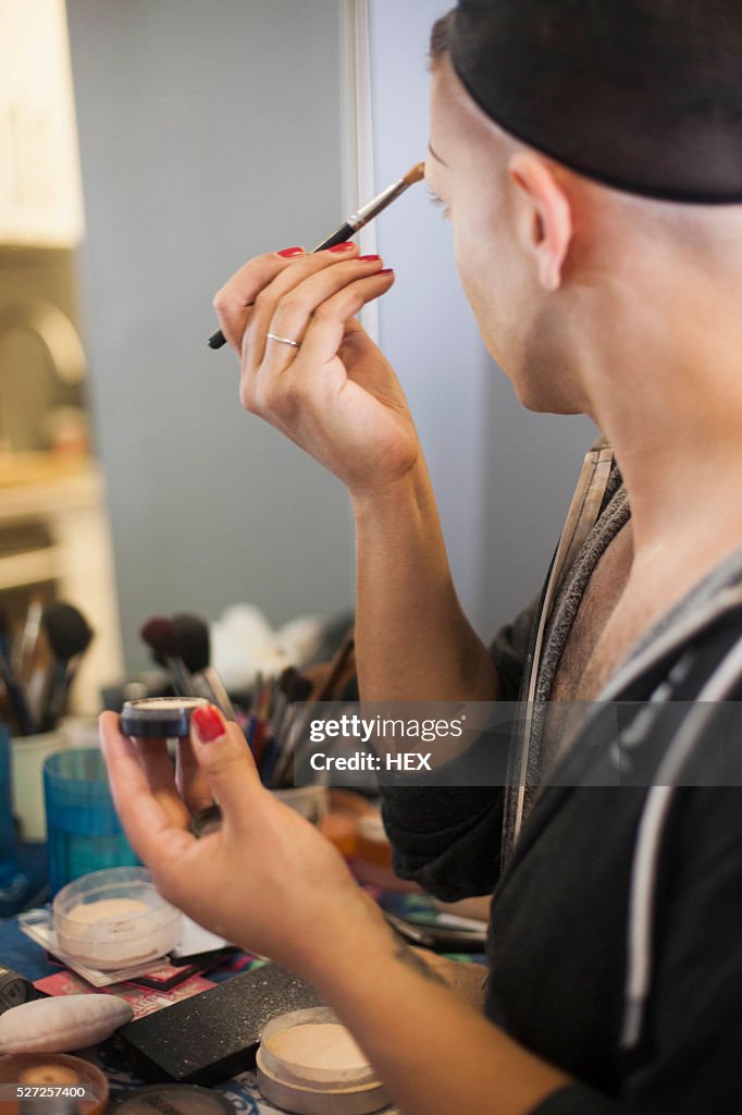 Man Using Drag Young Man Applying Drag Makeup High-Res Stock Photo - Getty Images