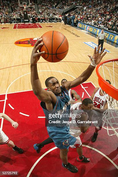 Gilbert Arenas of the Washington Wizards dunks against Othella Harrington of the Chicago Bulls in Game two of the Eastern Conference Quarterfinals...