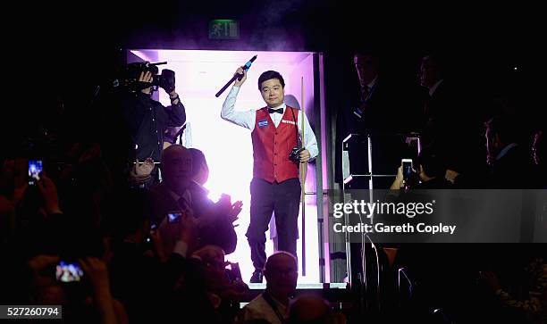 Ding Junhui walks into the arena ahead of the final session of the World Snooker Championship final at the Crucible Theatre on May 02, 2016 in...