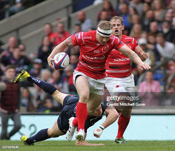 Chris Leathem of Army evades a tackle during the Babcock Trophy rugby union match between The British Army and the Royal Navy played in Twickenham...