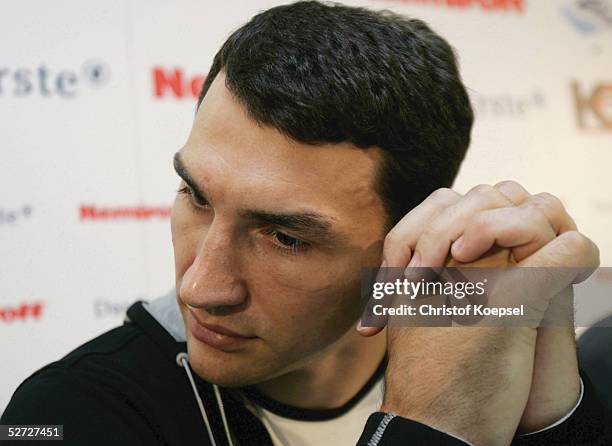 Wladimir Klitschko of Ukraine looks down during a press conference on April 18, 2005 in Dortmund, Germany. Wladimir Klitschko will take on Esilio...