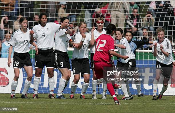 Christine Sinclair of Canada shoots a freekick during the nations match between Germany and Canada at the Friedrich-Ebert-Stadion on April 24, 2005...