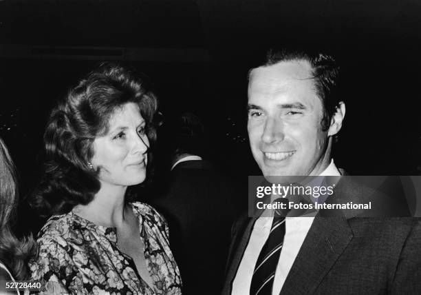 American model and actress Suzy Parker and her husband actor Bradford Dillman, at an event, late 1960s.