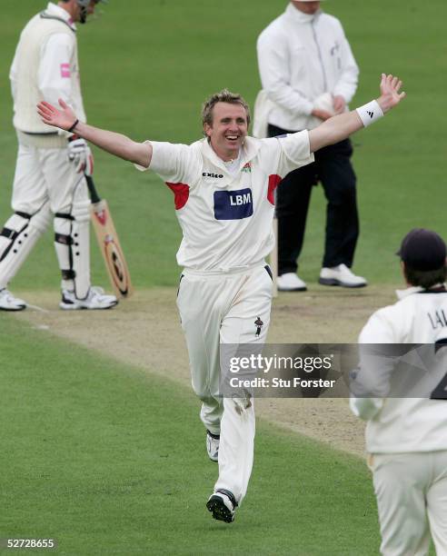 Lancashire bowler Dominic Cork celebrates after taking the wicket of Chaminda Vaas during Day two of the Division Two Frizzell County Championship...