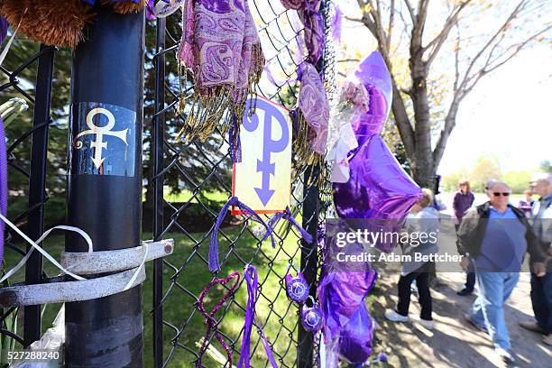 Tributes and memorials dedicated to Prince on the fence that surrounds Paisley Park on May 2, 2016 in Chaska, Minnesota. Prince died on April 21,...